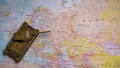 Toy tank model on map of Europe Union.