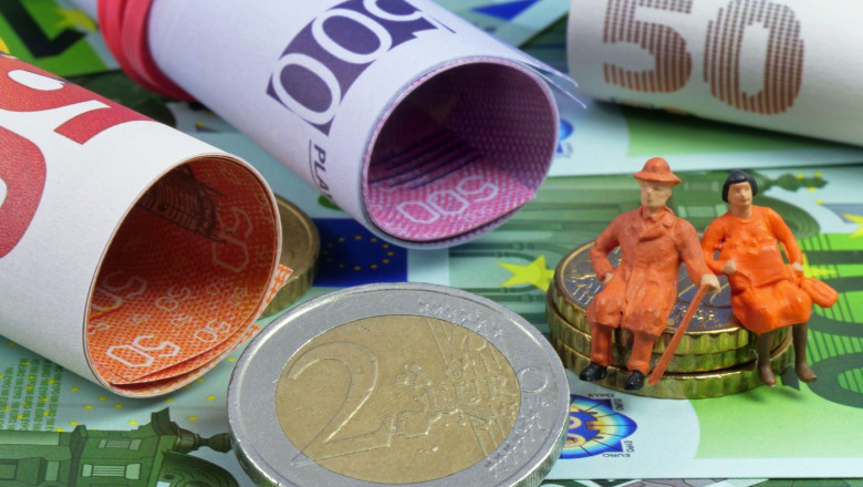 Pension as a symbolic image with euro banknotes and coins