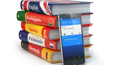 E-learning. Mobile dictionary. Learning languages online. Smartphone with books. 3d illustration