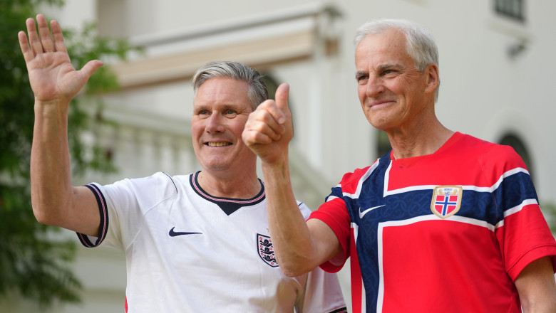 Prime Minister Sir Keir Starmer (left) and Norway's Prime Minister Jonas Gahr Store pose as they wear their national team's football shirts prior to a meeting at the British Embassy on the sidelines of the Nato summit in Ankara, Turkey. Picture date: Tues