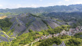 JINHUA, CHINA - JULY 16: Aerial view of solar panels at an agrivoltaic power generation project on July 16, 2026 in Jinh