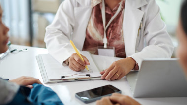 Pediatrician Filling Medical History