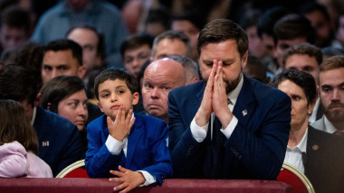Vice President JD Vance prays while kneeling at St. Peter's Basilica