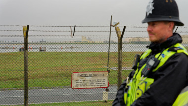 Five men arrested on terrorism charges after three vans were stopped near RAF Fairford in which police viewed as being they consistent with improvised