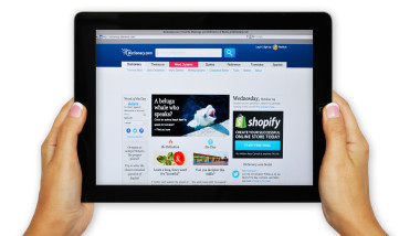 iPad screen showing Dictionary.com website