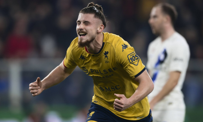 Genoa CFC v FC Internazionale - Serie A Radu Dragusin of Genoa CFC celebrates after scoring a goal a Carlos Augusto of F