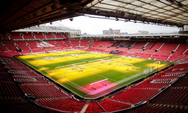 MUFC Manchester United FC ground pitch being treated after a game. .