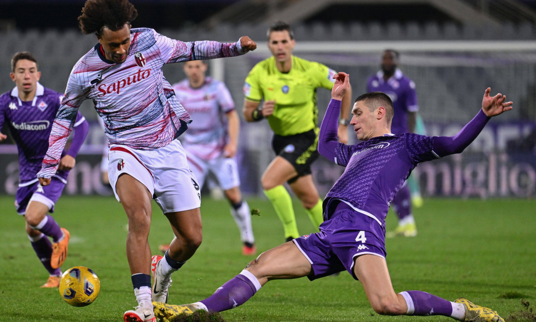 Bologna FC s forward Joshua Zirkzee against ACF Fiorentina s defender Nikola Milenkovic during ACF Fiorentina vs Bologna