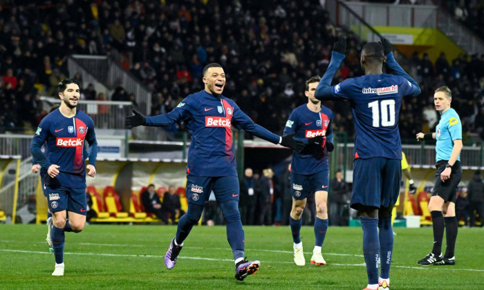 Kylian Mbappe ( 7 - PSG ) celebrates with Randal Kolo Muani ( 10 - PSG ) during the French Cup match between US Orleans