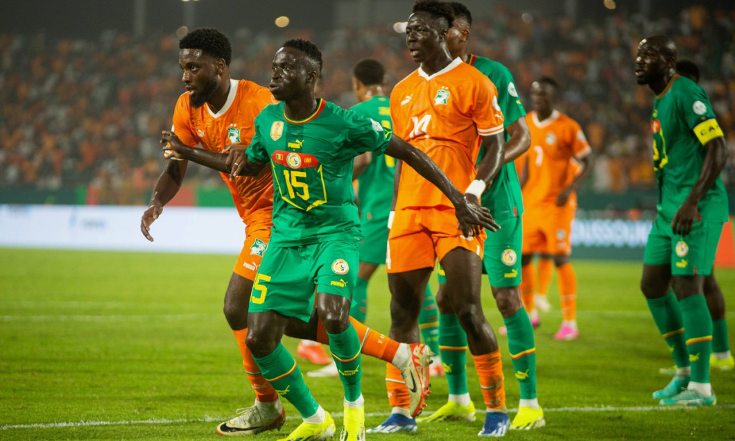Yamoussoukro, COTE D IVOIRE - JANUARY 29; KrĂ pin Diatta of Senegal and Cote D Ivoire defenders during the TotalEnergies