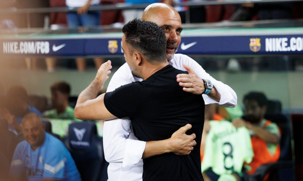 Xavi Hernandez of FC Barcelona and Pep Guardiola of Manchester City during the benefic friendly match to raise funds for ELA between FC Barcelona and Manchester City at Spotify Camp Nou in Barcelona, Spain.