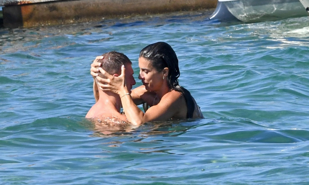 Italian TV presenter Melissa Satta and Elisabetta Canalis with their new boyfriends tennis champion Matteo Berrettini and kickboxing champion Georgian Cimpeanu on the beach in Sardinia