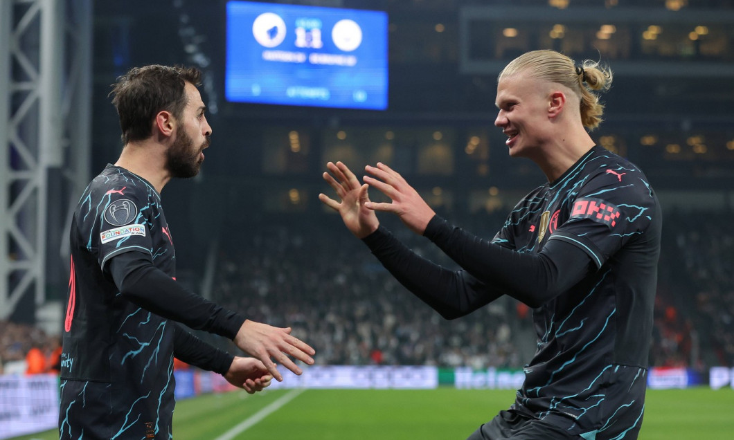 Copenhagen, Denmark, 13th February 2024. Bernardo Silva (L) of Manchester City celebrates with Erling Haaland after scor