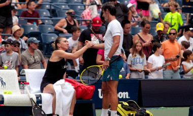 Flushing Meadows, New York, USA. 23rd Aug, 2022. Romania&apos;s Simona Halep clasps hands with her new coach, Patrick Mouratoglou while practicing for the U.S. Open today at the National Tennis Center in Flushing Meadows, New York. The tournament begins next M