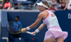 New York, NY - August 29, 2022: Simona Halep of Romania serves during 1st round of US Open Tennis Championship against Daria Snigur of Ukraine at Billie Jean King National Tennis Center