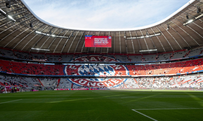 Die Suekurve in der Allianz-Arena mit Logo des FC Bayern Muenchen, Sonne auf der Gegengerade. GER, FC Bayern Muenchen ge