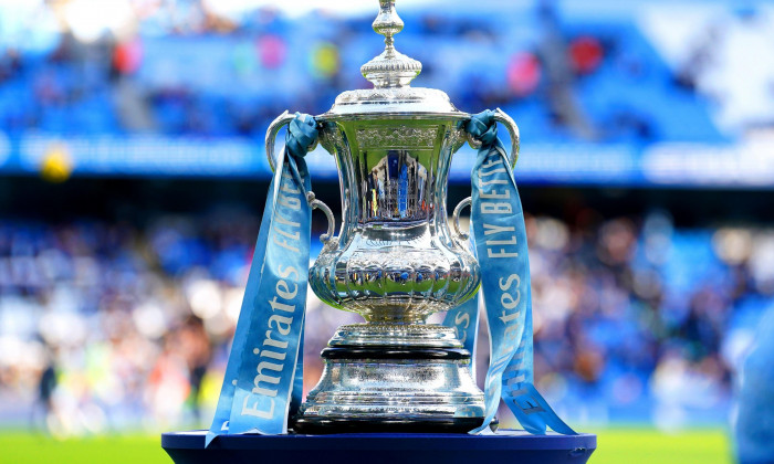 The FA Cup trophy on display ahead of the Emirates FA Cup Third Round match at the Etihad Stadium, Manchester. Picture date: Sunday January 7, 2024.