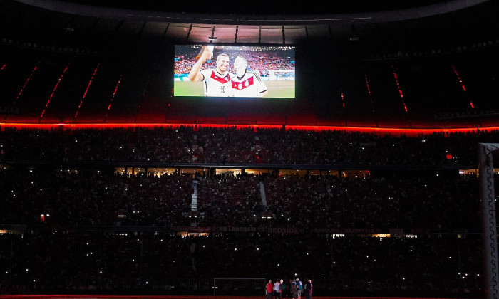 Munich, Germany. 28th August 2018. FC Bayern Munich - Chicago Fire Soccer, Munich, August 28, 2018Scoreboard with szenes of the World Cup victory 2014, , Screen, Screenboard, Digital, LED, Display, Monitor, Final result, with Lukas PodolskiFC BAYERN MUN