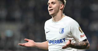 Louis Munteanu se bucura dupa un gol marcat in meciul de fotbal dintre Rapid Bucuresti si Farul Constanta, din cadrul Pl