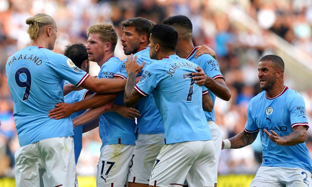 Manchester City players celebrate after Bernardo Silva scores their side's third goal of the game during the Premier League match at St. James' Park, Newcastle. Picture date: Sunday August 21, 2022.
