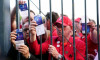 File photo dated 28-05-2022 of Liverpool fans stuck outside the ground showing their match tickets before the UEFA Champions League Final at the Stade de France, Paris. French interior minister Gerald Darmanin has apologised to "everyone who suffered from
