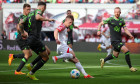 Leipzig, Germany. 13th Apr, 2024. Soccer: Bundesliga, RB Leipzig - VfL Wolfsburg, Matchday 29 at the Red Bull Arena. Leipzig's Dani Olmo (M) on the ball. Credit: Jan Woitas/dpa - IMPORTANT NOTE: In accordance with the regulations of the DFL German Footbal