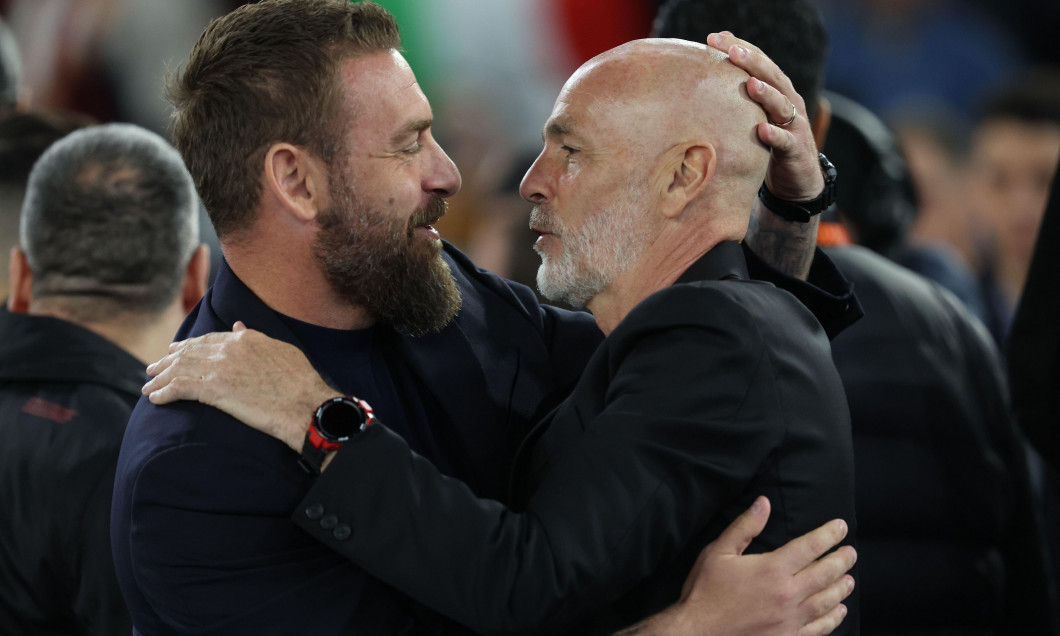 Rome, Italy. 18th Apr, 2024. Rome, Italy 18.04.2024: Stefano Pioli coach Milan greet Daniele De Rossi coach of Roma before the UEFA Europa League 2023-2024, quarter final, football match between AS Roma vs AC Milan at Olympic Stadium in Rome. Credit: Inde