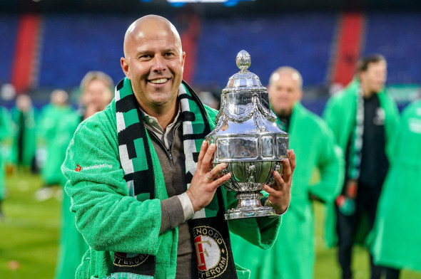Rotterdam, Netherlands. 21st Apr, 2024. ROTTERDAM, NETHERLANDS - APRIL 21: Head Coach Arne Slot of Feyenoord with the TOTO KNVB Cup trophy during the TOTO KNVB Cup final match between Feyenoord and NEC at Stadion Feyenoord on April 21, 2024 in Rotterdam,