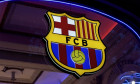 Illustrative editorial showcasing the iconic logo of FC Barcelona, a leading football club based in