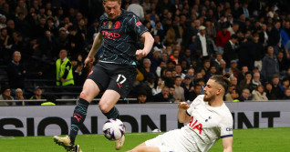 Tottenham Hotspur v Manchester City, London, UK - 14 May 2024 Radu Dragusin of Tottenham Hotspur tackles Kevin De Bruyne