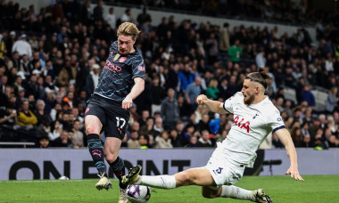 Kevin De Bruyne of Manchester City is tackled by Radu Draguin of Tottenham Hotspur during the Premier League match Tottenham Hotspur vs Manchester City at Tottenham Hotspur Stadium, London, United Kingdom, 14th May 2024(Photo by Mark Cosgrove/News Image