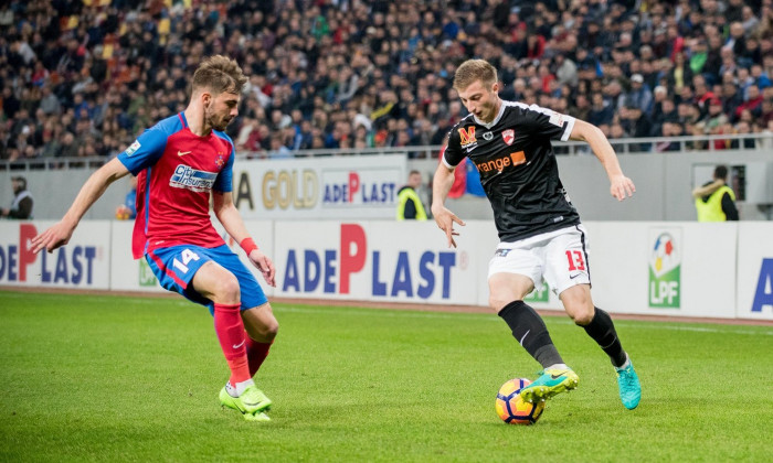 Bucharest, Romania. 1st March 2017. Florin Nita #1 of FC Steaua Bucharest and Iliuta Daniel Popa #13 of Dinamo Bucharest during the LPF - Football Romanian League 1 Orange 2016-2017, game between FC Steaua Bucharst and FC Dinamo 1848 Bucharest at Nation