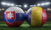 Two soccer balls in flags colors on a stadium blurred background. Group E. Slovakia and Romania. 3D image.