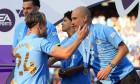 Etihad Stadium, Manchester, UK. 19th May, 2024. Premier League Football, Manchester City versus West Ham United; Manchester City manager Pep Guardiola congratulates Jack Grealish during the medal presentation Credit: Action Plus Sports/Alamy Live News