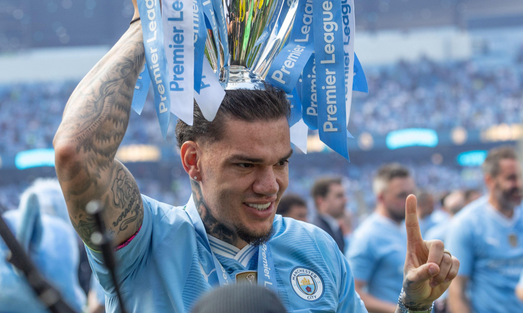 Ederson of Manchester City lifts the Premier League Trophy during the Premier League match Manchester City vs West Ham United at Etihad Stadium, Manchester, United Kingdom, 19th May 2024(Photo by Mark Cosgrove/News Images)