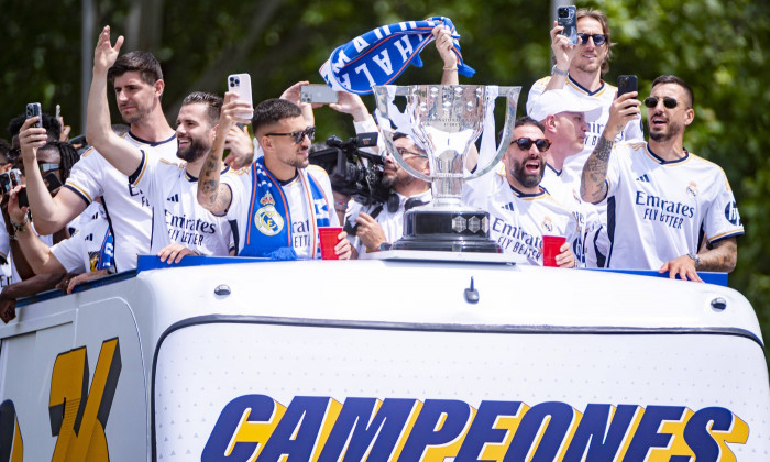 Real Madrid Celebrate Winning The La Liga EA Sports Title 2023/2024 MADRID, SPAIN - MAY 12: The open top bus with the Re
