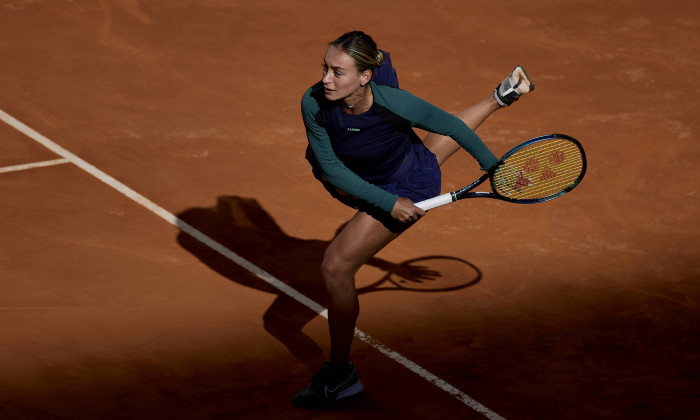 Mutua Madrid Open - Day Two Ana Bogdan of Romania serves against Xiyu Wang of China during day two of the Mutua Madrid O