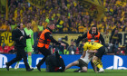 Borussia Dortmund v Real Madrid, London, UK - 1 Jun 2024 A pitch invader is tackled by stewards and Marcel Sabitzer of B
