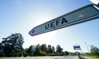 A signpost pointing towards the UEFA Headquarters in Nyon, Switzerland. Picture date: Tuesday October 10, 2023.