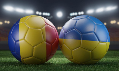 Two soccer balls in flags colors on a stadium blurred background. Group E. Romania and Ukraine. 3D image.