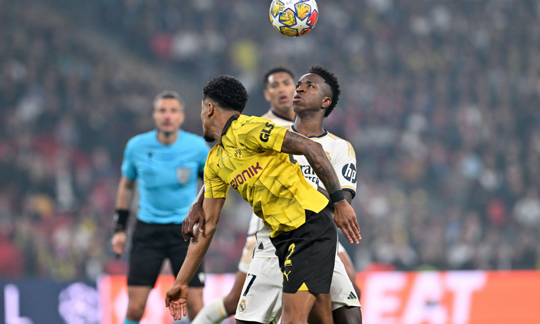 London, UK. 01st June, 2024. Ian Maatsen (22) of Dortmund pictured fighting for the ball with Vinicius Junior (7) of Real Madrid during a soccer game between German Borussia Dortmund and Spanish Real Madrid CF in the UEFA Champions League Final of the 202