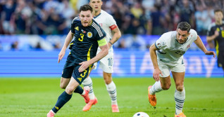 Cologne, Germany, June 19th 2024: Andrew Robertson (3 Scotland) and Fabian Schar (22 Switzerland) battle for the ball (d
