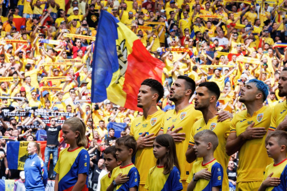 Munich, Germany. 17th June, 2024. Players of Romania seen singing national anthem before the UEFA Euro 2024 game between national teams of Romania and Ukraine at Allianz Arena. Final score; Romania 3:0 Ukraine Credit: SOPA Images Limited/Alamy Live News