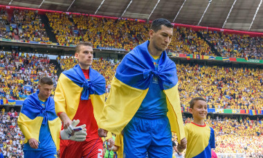 Munich, Germany. 17th June, 2024. Munich, Germany, June 17th 2024: Andriy Lunin (23 Ukraine) and Taras Stepanenko (6 Ukraine) while entering the pitch before the UEFA EURO 2024 Group E football match between Romania and Ukraine at Arena Munich, Germany. (