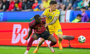 Belgium v Romania Euro 2024 22/06/2024. Group E Jeremy Doku of Belgium battles with Dennis Man of Romania during the Eur