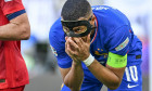 240625 EURO2024 FRANCE VS POLAND Kylian Mbappe (10) of France in pain and checks his nose under his mask during a soccer