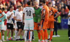 BERLIN, GERMANY - JUNE 25: Florian Grillitsch of Austria is congratulated by ex Ajax teammate Matthijs De Ligt of Netherlands during the UEFA EURO 2024 Group D match between Netherlands and Austria at Olympiastadion on June 25, 2024 in Berlin, Germany. (P