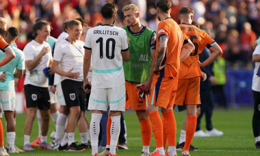 BERLIN, GERMANY - JUNE 25: Florian Grillitsch of Austria is congratulated by ex Ajax teammate Matthijs De Ligt of Netherlands during the UEFA EURO 2024 Group D match between Netherlands and Austria at Olympiastadion on June 25, 2024 in Berlin, Germany. (P