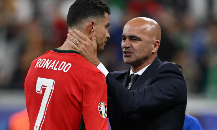 Hesse, Frankfurt, Germany. 02 July 2024, Hesse, Frankfurt/M.: UEFA Euro 2024, European Championship, Portugal - Slovenia, final round, round of 16, Frankfurt Arena, Portugal's Cristiano Ronaldo (l) and Portugal coach Roberto Martinez celebrate victory aft