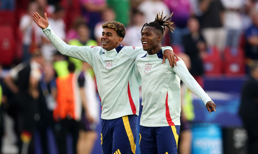 STUTTGART, GERMANY - JULY 05: Nico Williams of Spain and Lamine Yamal of Spain celebrate with the fans after their sides victory the UEFA EURO 2024 quarter-final match between Spain and Germany at Stuttgart Arena on July 05, 2024 in Stuttgart, Germany. ©